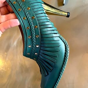 Made in Brazil, size 38, leather. Gently worn, beautiful color and design.